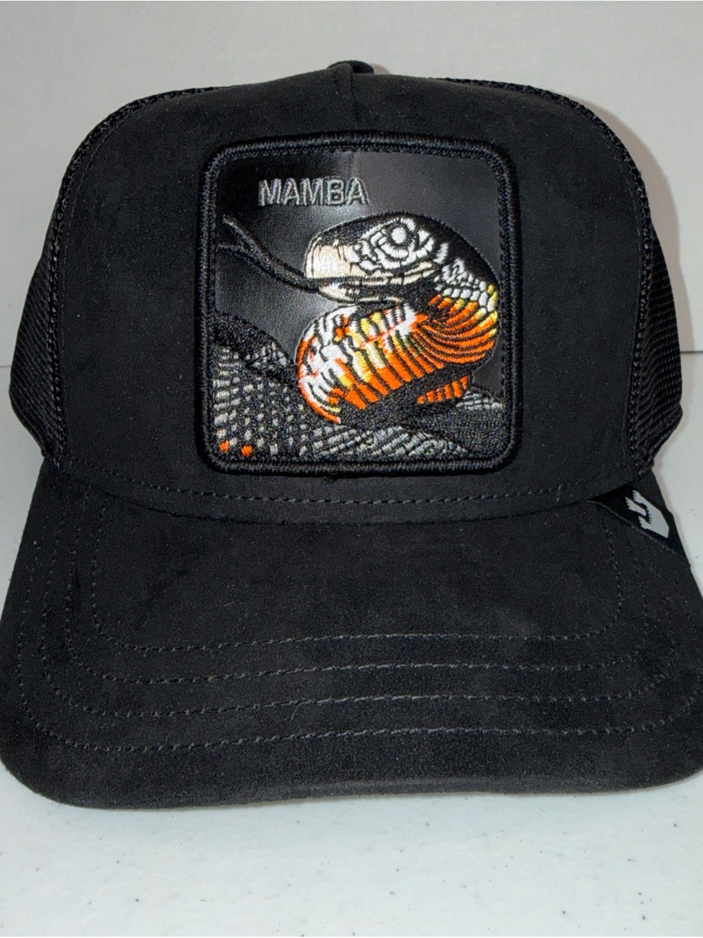 Goorin Bros Black 'Mamba' Embroidered Snake Trucker Hat with Orange Detail